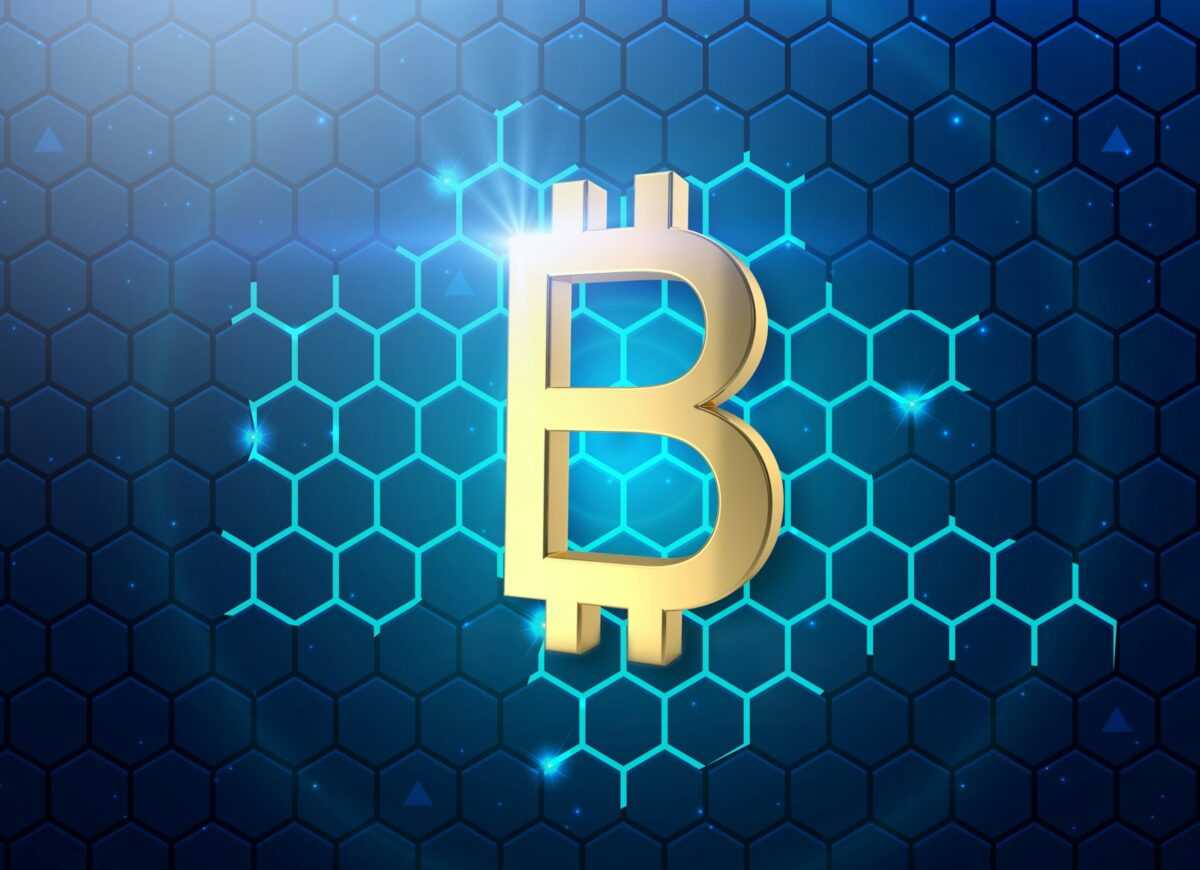 a golden bitcoin on a blue hexagonal background